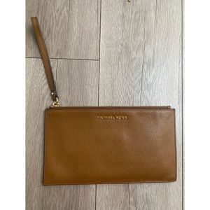 Brown Michael Kors wristlet bag